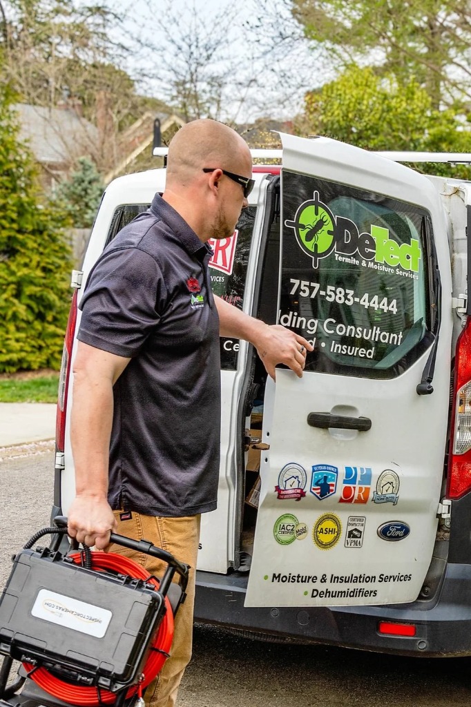 Technician preparing equipment at a service van